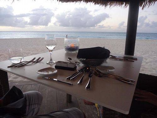 The palapa on the beach. at Elements Restaurant in Oranjestad