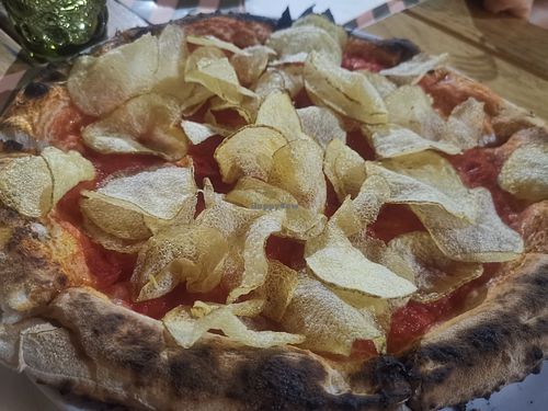 I asked for a red pizza with fried chips. Was really good, especially the pizza dough! at Fossi Bar & Cucina in Otranto