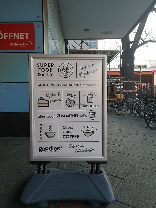 Poster - "vegan and vegetarian, gluten and sugar free options, everything to take away as well at Goodies Berlin - Globetrotter in Berlin