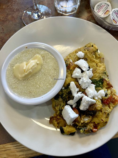 Greek scramble and grits with vegan butterr  at Honey & Co  in Salem