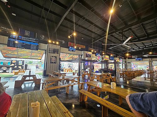 Open air dining, indoor and outdoor seating with restaurant amenities and entertainments.  at Get Loaded in Humble