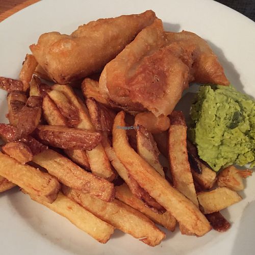 battered sausage and chips with minted mushy peas  at Mono in Glasgow