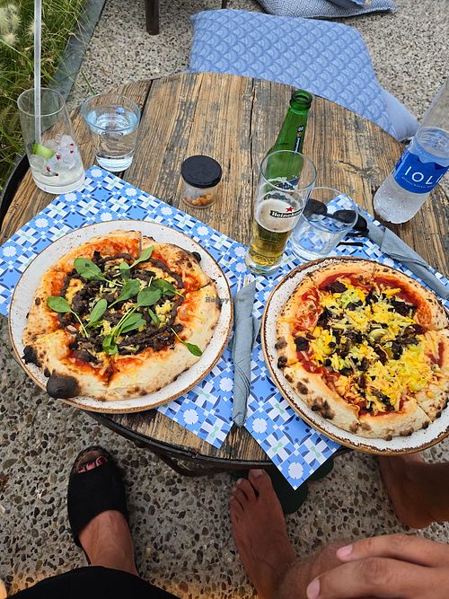 Vegan pizza's with vegan cheese. at FLY ME Sun & Stars Bar in Lefkada