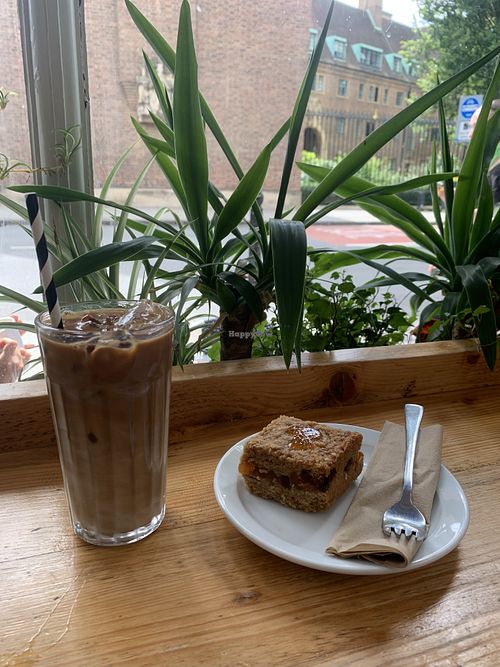 Iced soya latte and gf vegan apricot slice  at Bridges in Cambridge