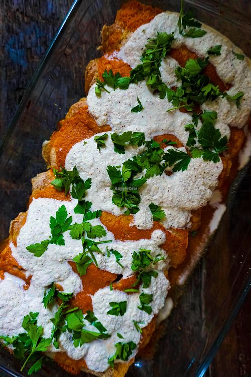 Alkaline enchiladas with housemade brazilian nut cheese & heirloom tomato sauce at Alkaline Valley - Order & Pick-Up in Amsterdam