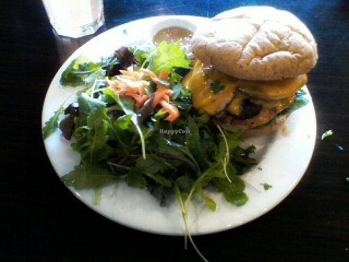 ORGANIC CHICKEN BURGER with baby greens side salad. at Green Corner Cafe in Glendale