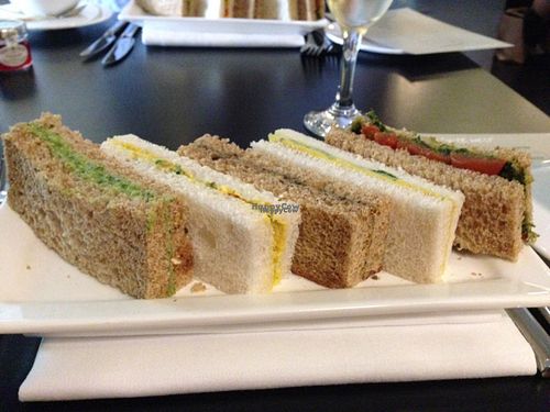 finger sandwiches: from L to R: avocado chili mousse, tofu scramble w/mustard cress, portobello mushroom pate, lemon & thyme tahini, roast tomato w/sunflower seed pesto at Raw - La Suite West in West London