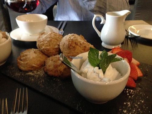scones with coconut cream and strawberries  at Raw - La Suite West in West London
