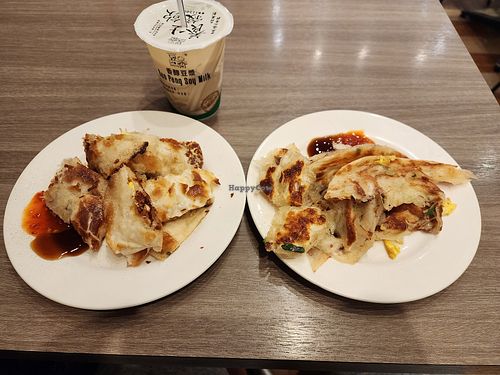 Hash brown dan bing (left), standard scallion pancake (right) at Wei Mei Breakfast Restaurant in Taipei