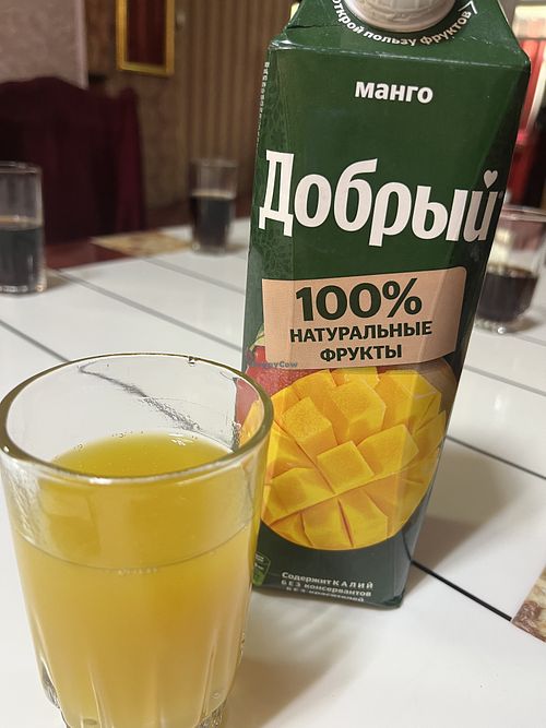 Mango juice served by entire container  at Delhi Darbar in Khorog