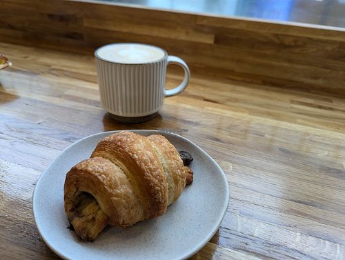 Creamy mushroom croissant and oat milk latte at Luna Bakery in Loughborough