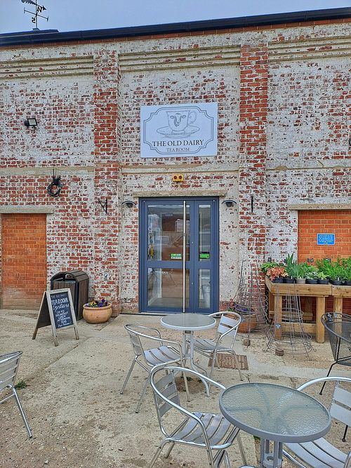 Outdoor seating and entrance at The Old Dairy Tearoom  in Alton