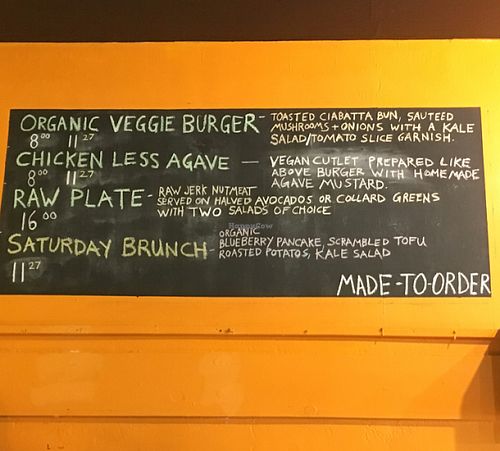 Kale cafe menu board at Kale Cafe Vegan Kitchen in Daytona Beach