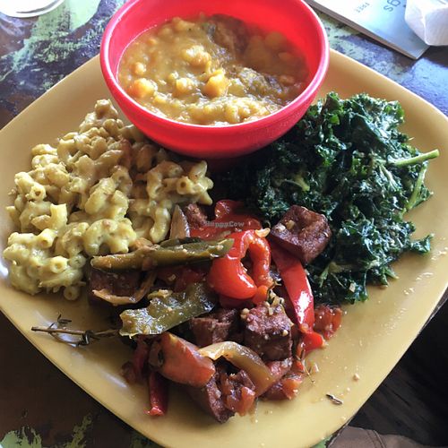 Vegan value meal with curry, Mac cheez, seiten, kale salad at Kale Cafe Vegan Kitchen in Daytona Beach