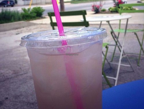 Lavender lemonade in the outdoor seating area at Rainbow Bakery in Bloomington