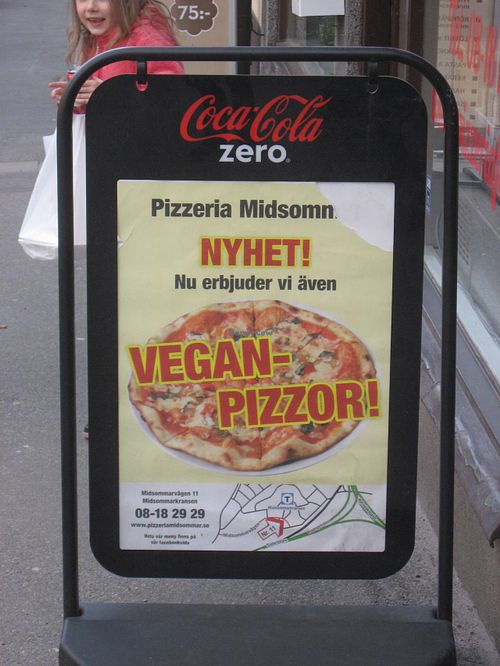 Visible sign of vegan pizzas outside! at Pizzeria Fellini in Stockholm