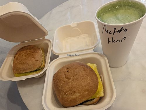 Vegan breakfast sandwich, vegan pesto melt, and 16 oz hot matcha with hemp milk at Retro Coffee  in Seattle