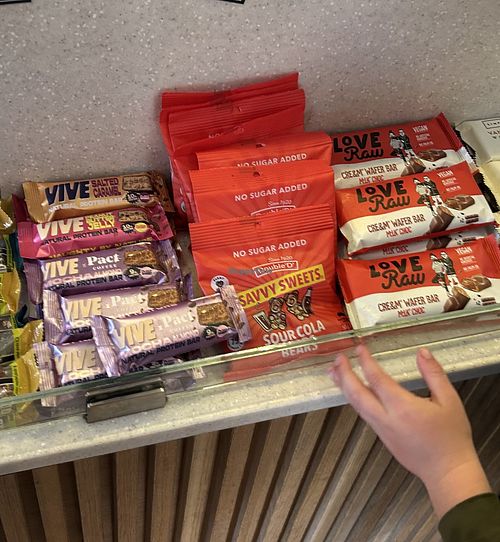 A selection of packaged vegan snacks near the till ☺️  at Grounds Cafe in Rugeley