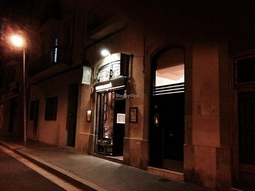outside at night  at Cafe Mandacaru in Barcelona