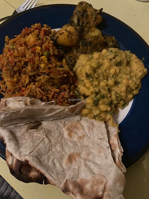Tarka daal, saag aloo, vegetable fried rice and tandoori roti.  at Tudor Tandoori in Stonehouse