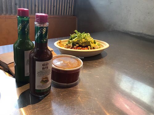Veg bowl with hot sauce ready to go! at Chipotle in Bloomington
