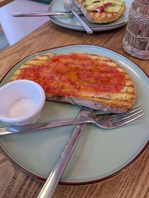 Tomato and olive oil toast at Kafeteros in Santander