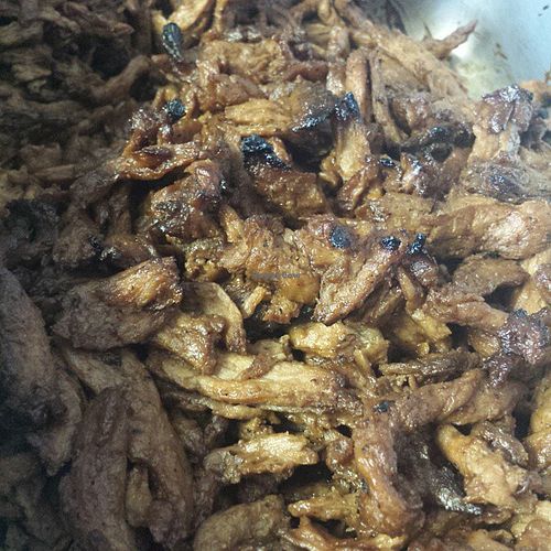 Smokey curls, slow smoked over hickory for hours then added in our house made bbq sauce. at BBQ Revolution in Austin