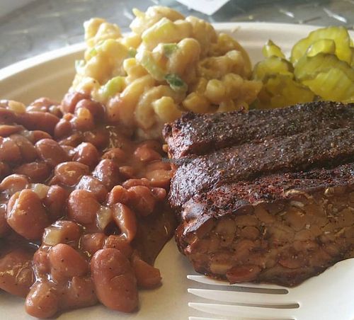 Tempeh 'Ribs' from Flying Tempeh Bros. in Austin Texas.  Seen here on a BBQ Plate with ranch style baked beans and macaroni and cheeze at BBQ Revolution in Austin
