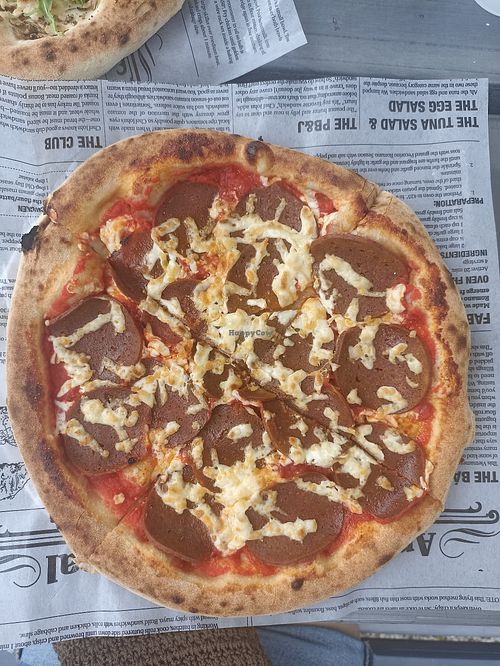 Plantironi pizza. Moxy mozzarella, plantironi, tomato suace at Pizza 90's in Panama City