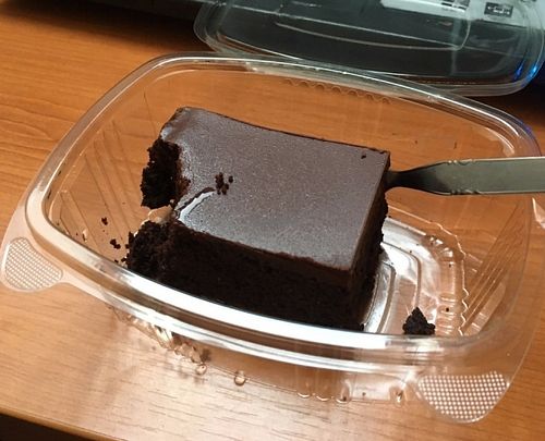 Vegan brownie. A must. It was so delicious, I had to take a bite before taking the picture.  at Loving Hut in Maribor