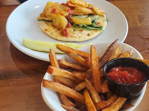 Harissa Coconut JackFruit Pita. Comes with garlic sauce for a drizzle or dipping & a $2 upcharge for handcut fries instead of chips. at Burn 'Em Brewing in Michigan City