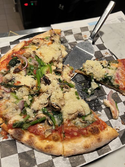 Veggie pizza with vegan cheesee  at Piece Out Del Ray in Alexandria