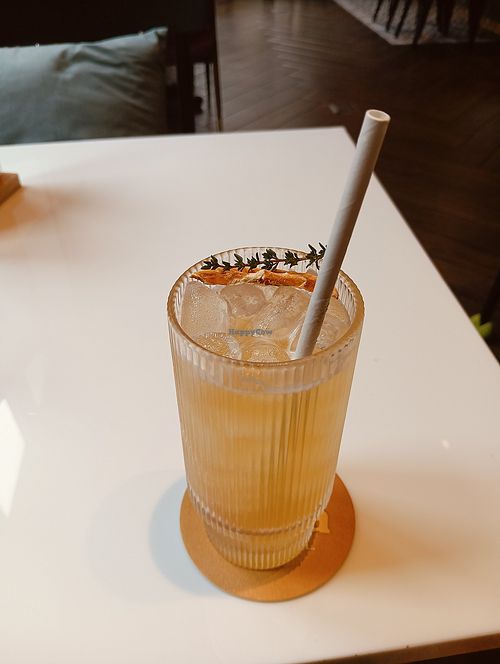 A complimentary passion fruit kombucha. High qualitea! at Amavi Kom & Vegan in Ho Chi Minh City