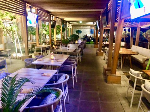 Outside dining  at Village Bistro - The First Collection in Dubai