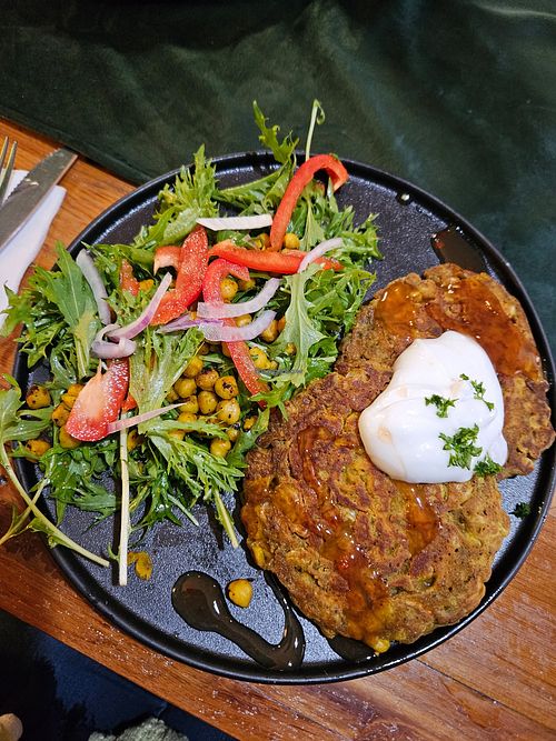 Homemade curried corn and chickpea fritters. Salad had roasted chickpeas. Coconut yogurt at Blackball's Inn and 08 Cafe in Blackball