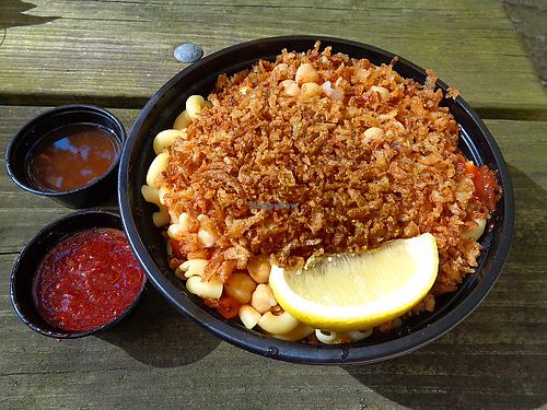 Akhnaton Bowl (Koshari)
Mixed rice, macaroni, and lentils topped with tomato sauce, crispy fried onions, side of our Daeh mixture of spiced garlic and vinegar. at King Tut - Egyptian Street Food in Brecksville