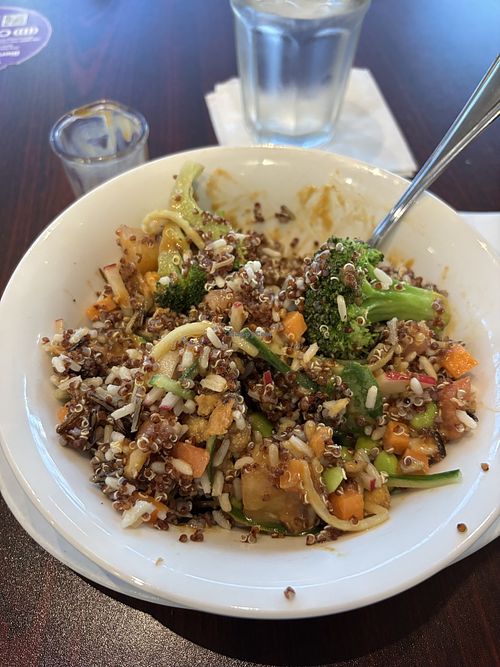 Red quinoa, wild rice, broccoli , cauliflower, tofu, edamame, pineapple, cucumber, sweet potato, dried berries, sunflower seeds, peanut sauce dressing and mor  at YYZ - LEE Kitchen - T1 in Mississauga