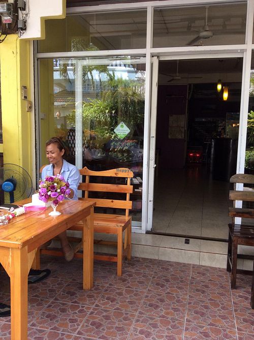 Friendly owner of restaurant  at Kanlaya Vegetarian in Chiang Mai
