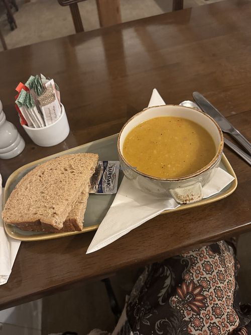 This is the vegan soup of the day (pumpkin and lentil!). They gave me normal butter with it, but that’s probably because I didn’t specify I was vegan when ordering    at Bessie's Cafe in Dunfermline