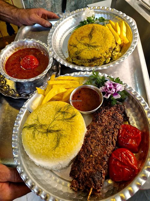 Vegetable sour kebab with beans and rice at Beynolmelal Vegan Restaurant in Rasht