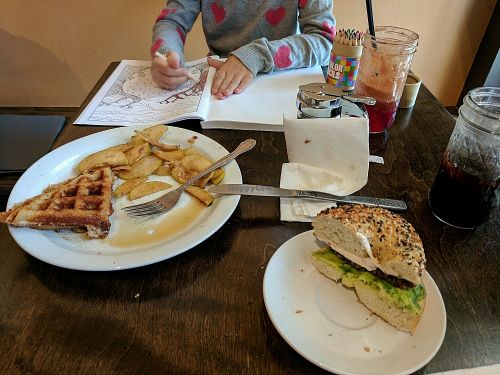 Apple pie waffle and vegan sausage bagel at Nectar Cafe in Portland
