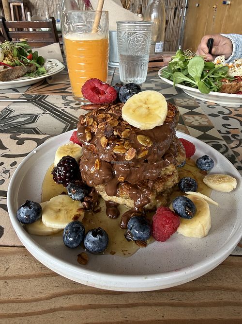 Banana pancakes with vegan Nutella, fruit and syrup   at La Papaya in La Palma