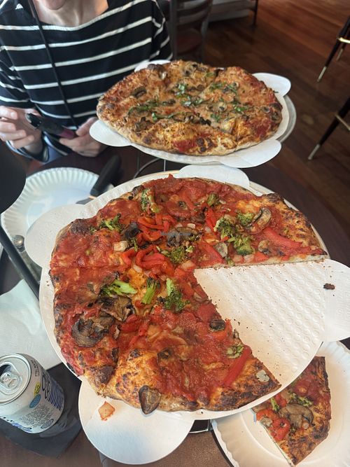 nurse shark without cheese and a mushroom & basil with vegan cheese (both are the small personal pizza size)   at Pizza Shark in Chatham