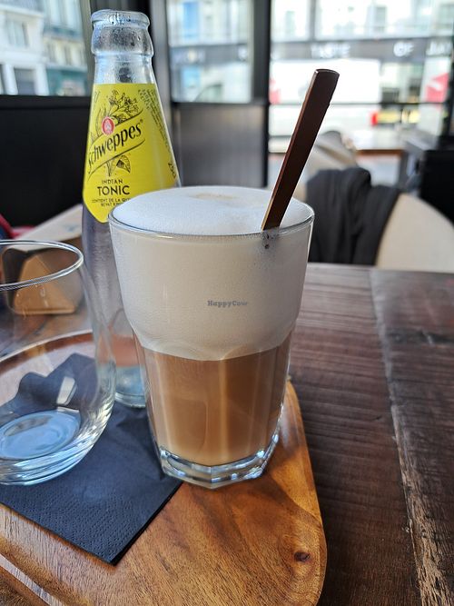 Latte macchiato with oat milk at Expo & Kafie  in Oostende