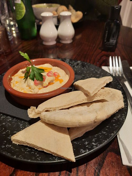 Flatbread and hummus - in the background soup of the day at Queens Hotel Brighton in Brighton