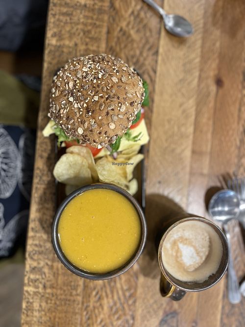 VEGAN APPLEWOOD & CARAMELISED ONION CHUTNEY & soup with soya latte   at The Deli Next Door in Elgin