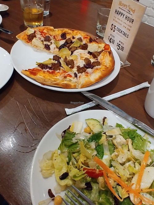 Build your own pizza with beyond sausage and Daiya cheese, and the Big Vegan Salad. at Honey Seed in Chattanooga