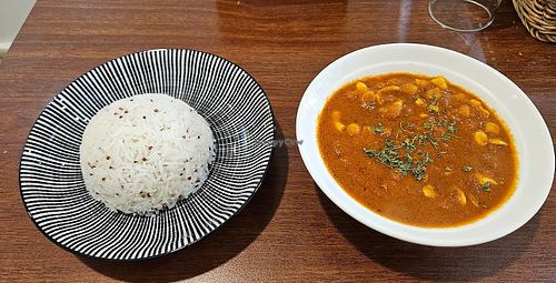 Chickpea cashew curry with red quinoa white rice.   at Sardar Ji Indian Vegetarian Cuisine - 薩達印度蔬食/素食料理餐館 in Tainan
