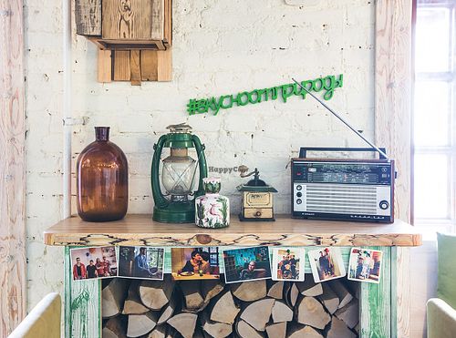 Vegetarian café “Ukrop”-Summer

The interior of “Ukrop Summer” at 14th Malaya Konushennaya St., ambience is inspired by a summer house. There are even real swings that remind the pleasant summer time.  at Cafe Ukrop II in St Petersburg