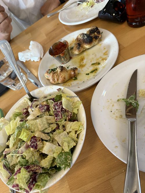 Garlic knots and cesear salad. Garlic knots were especially good.  at Via Tevere Main Street in Vancouver